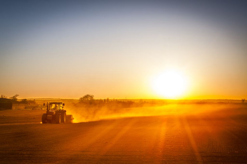 A tractor used to explain how does crop insurance work